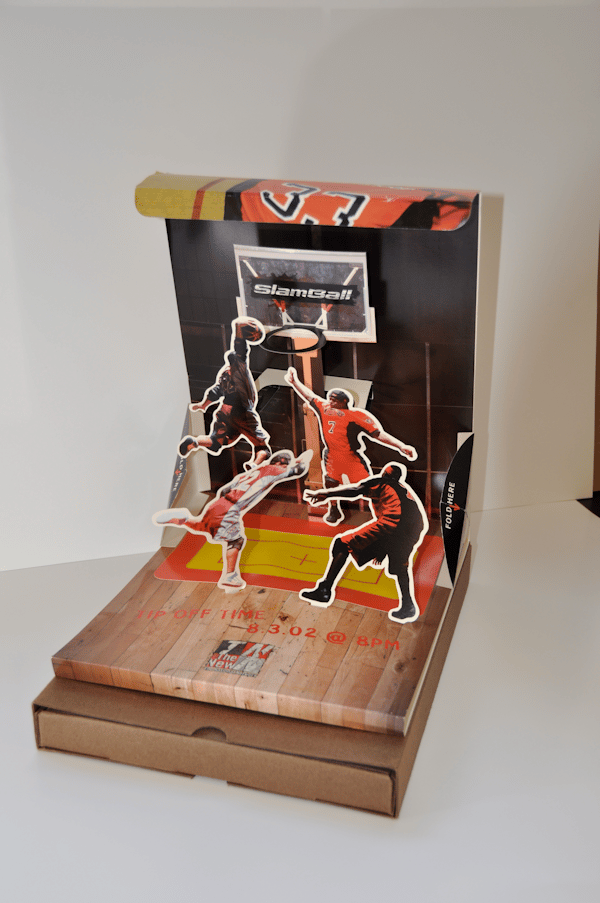 A cardboard box with a picture of basketball players on it